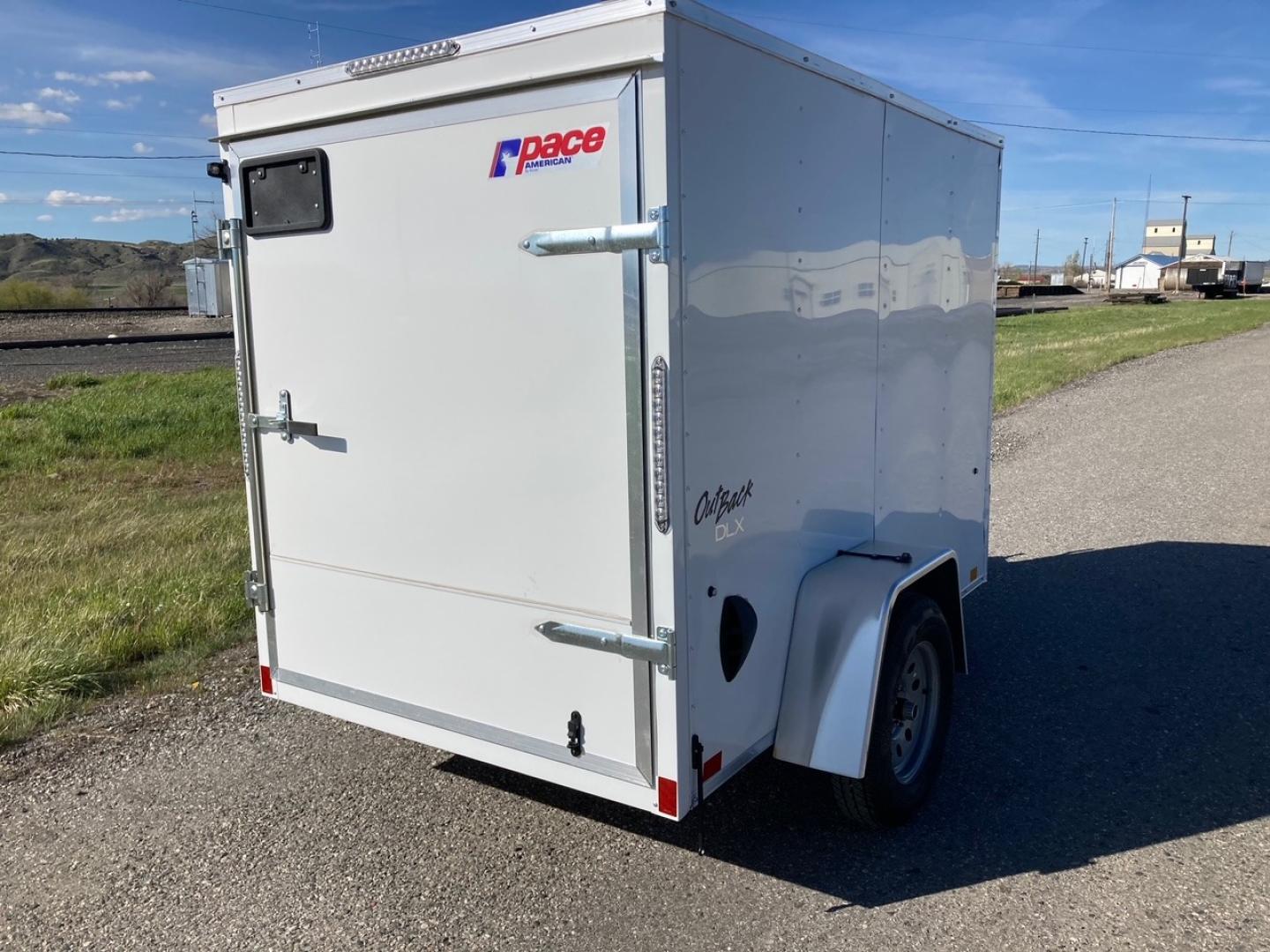 2024 Pace , located at 310 West 1st Ave, Big Timber, MT, 59011, (406) 860-8510, 45.833511, -109.957809 - Pace American Outback DLX 5 x 8 Enclosed Cargo, V-nose, 3k gvw, spring suspension, swing outdoor rear door, all lights LED, interior dome light with wall switch, high performance wood floor and sidewall interior, top wind jack, one piece aluminum roof, 15" radial tires, 2" coupler, quick lube hubs, - Photo#2